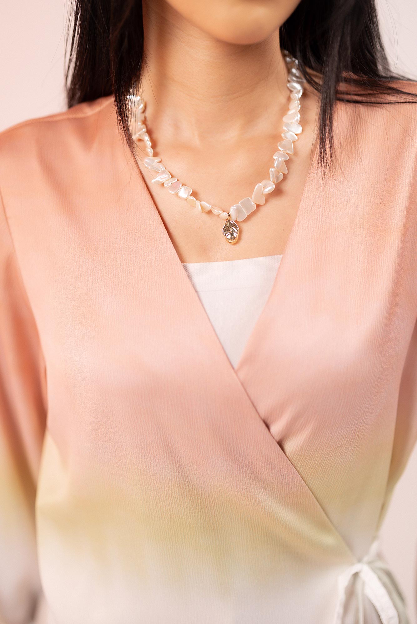 Handmade off-white stones with gold detail necklace