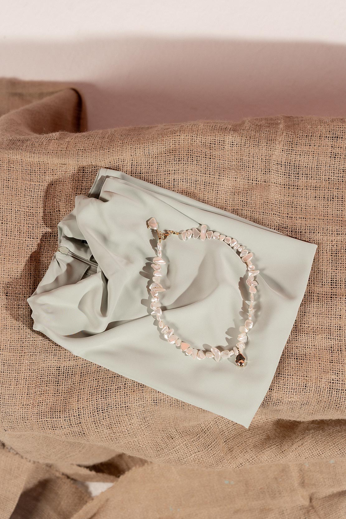 Handmade off-white stones with gold detail necklace