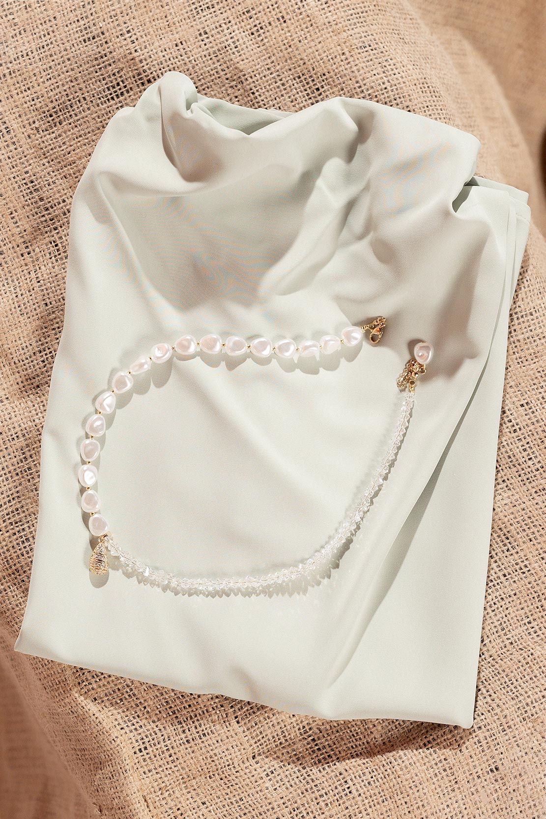 Handmade off-white stones with gold detail necklace