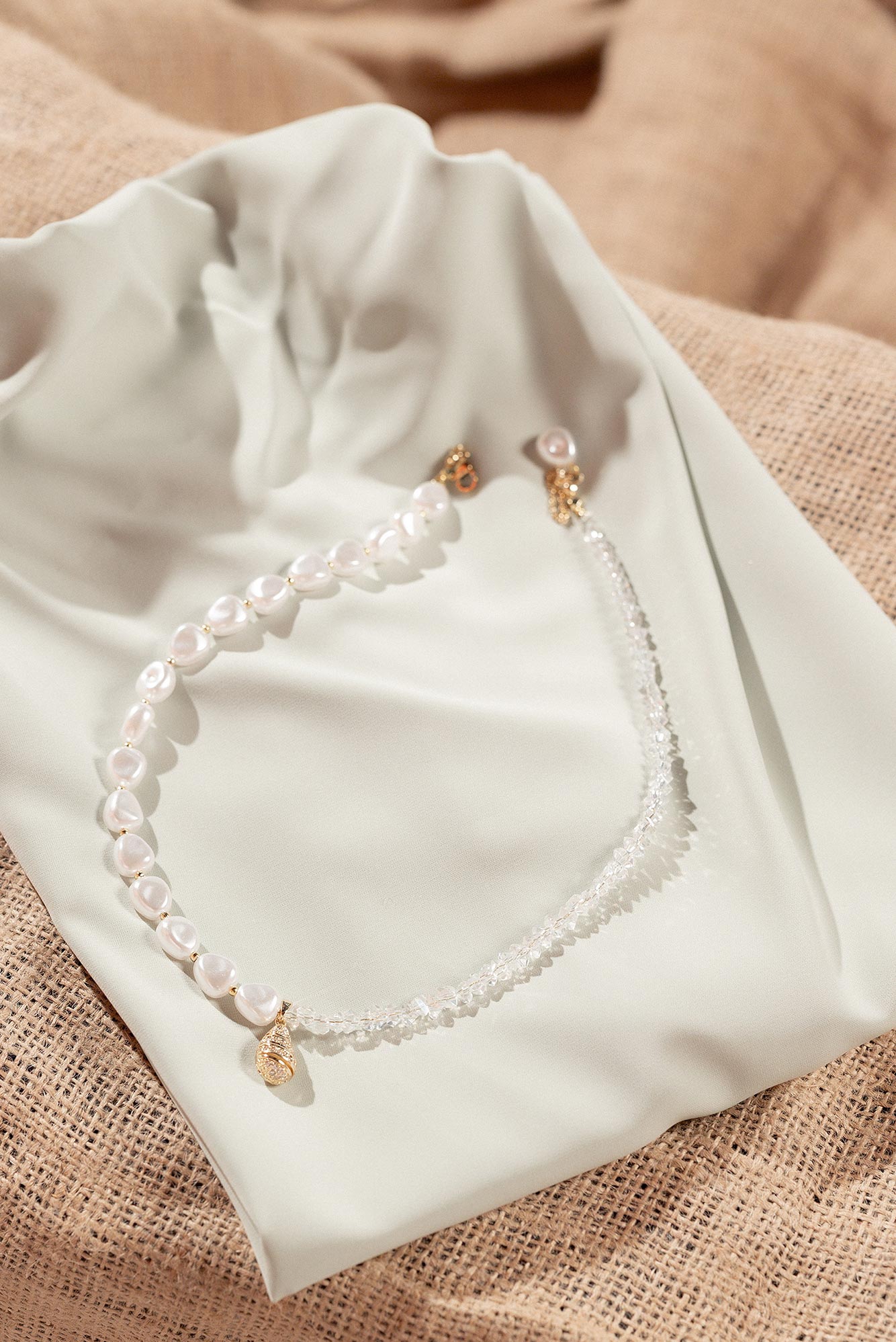 Handmade off-white stones with gold detail necklace