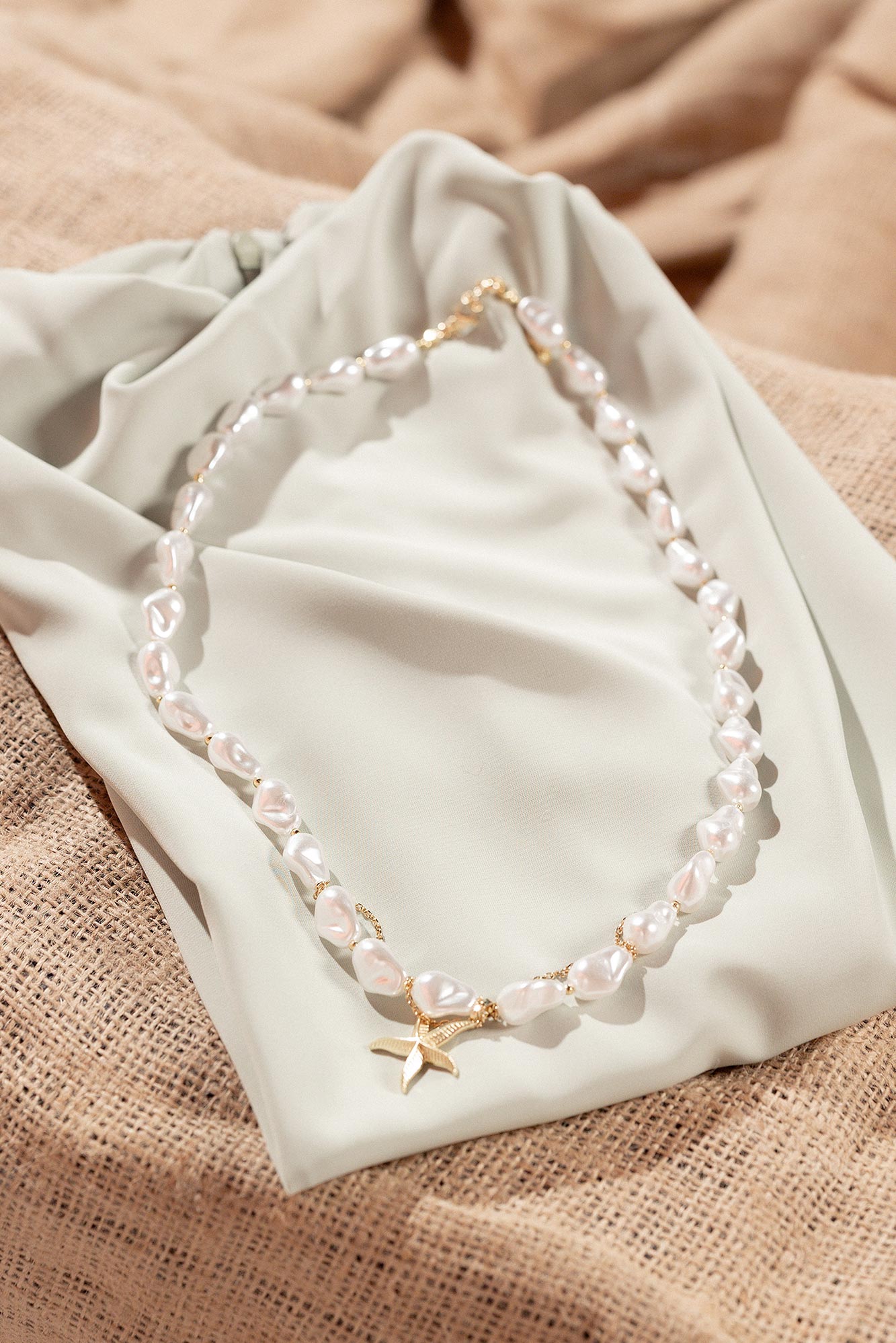 Handmade crystal & pearl layey necklace with gold star detail